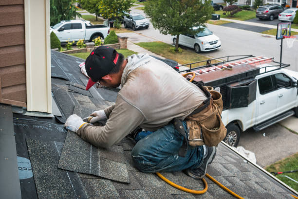 Professional Roofing technician working in Long Island, ME